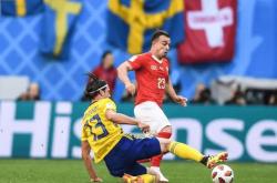 包含瑞士大胜波兰，欧预赛争霸赛场精彩纷呈的词条